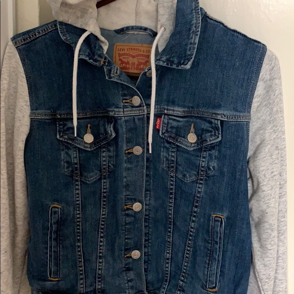 Woman’s Levi’s hooded jean jacket. Like new, never been worn.